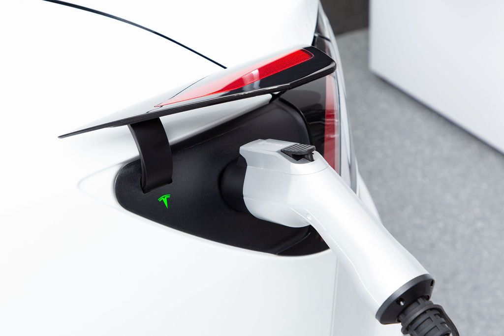 Splitvolt's NEMA 10-30 24 amp level 2 EV charger plugged into a Tesla